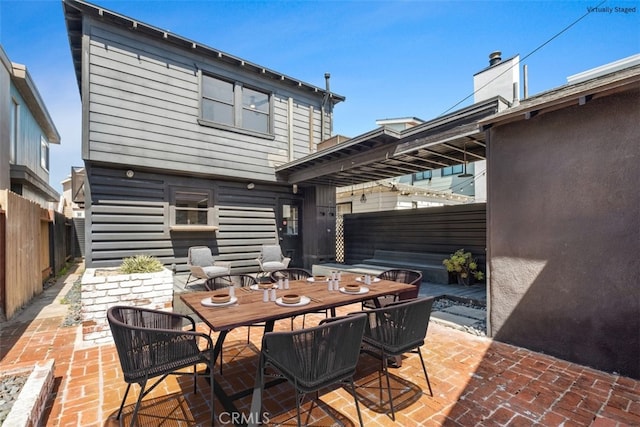 210 39th St, Newport Beach, CA 92663 - view of patio with a fenced backyard and outdoor dining space