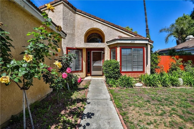 2003 Springcreek Cir, Upland, CA 91784 - doorway to property with fence and stucco siding