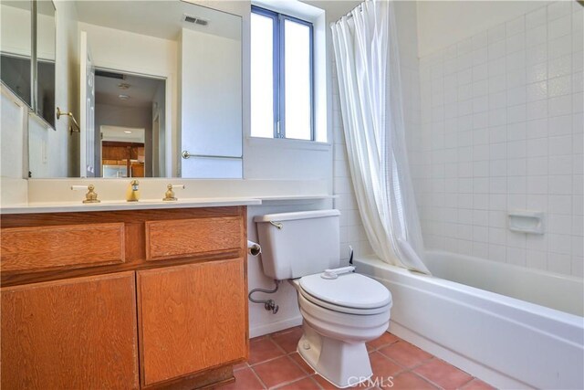 2003 Springcreek Cir, Upland, CA 91784 - bathroom with tile patterned floors, toilet, shower / bath combo with shower curtain, and vanity