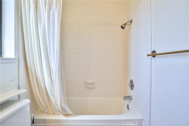 2003 Springcreek Cir, Upland, CA 91784 - bathroom featuring shower / bathtub combination with curtain and toilet