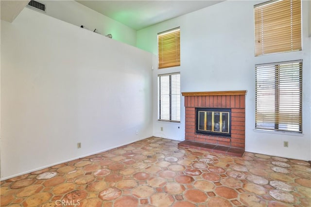 2003 Springcreek Cir, Upland, CA 91784 - unfurnished living room featuring a brick fireplace