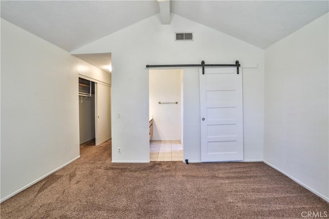 2003 Springcreek Cir, Upland, CA 91784 - unfurnished bedroom with carpet flooring, a closet, a barn door, and baseboards