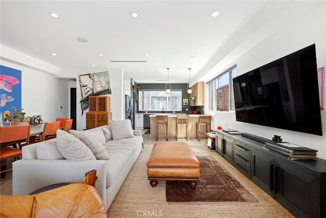 living room featuring recessed lighting