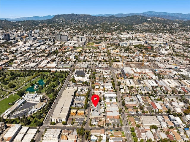 drone / aerial view featuring a mountain view