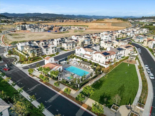 drone / aerial view with a mountain view and a residential view