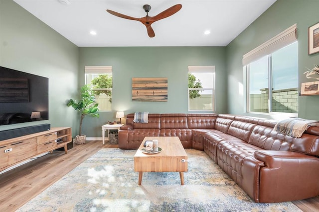 living room with baseboards, wood finished floors, recessed lighting, and ceiling fan
