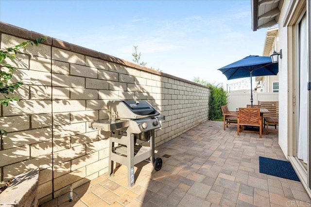 view of patio / terrace with a fenced backyard and outdoor dining area