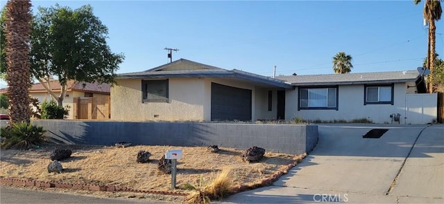 single story home with stucco siding