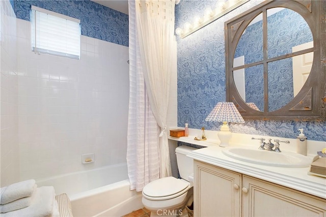 bathroom with shower / bath combination with curtain, wallpapered walls, vanity, and toilet