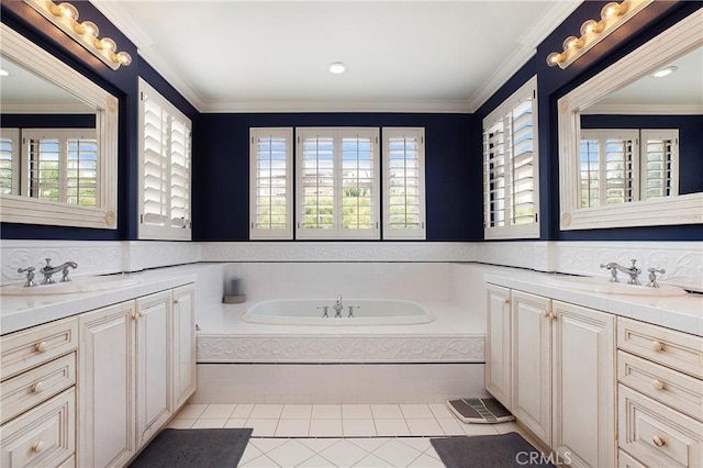 bathroom with vanity, a garden tub, crown molding, and tile patterned flooring