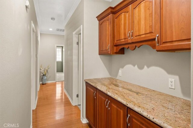 21729 Rose Canyon Ln, Saugus, CA 91390 - hallway with light wood finished floors, ornamental molding, baseboards, and recessed lighting