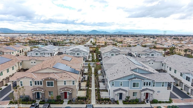 birds eye view of property with a residential view and a mountain view