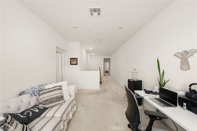 home office featuring light colored carpet and visible vents