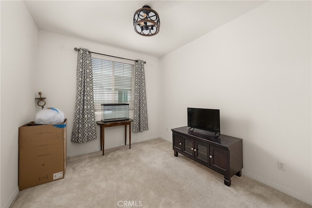 miscellaneous room with light colored carpet