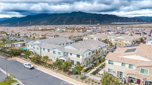 birds eye view of property featuring a residential view and a mountain view