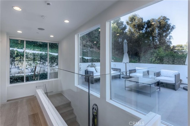 interior space with recessed lighting and wood finished floors