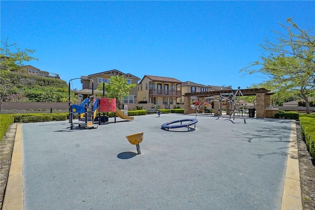 community play area featuring a residential view