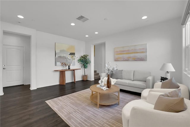 living area featuring wood finished floors, visible vents, and recessed lighting