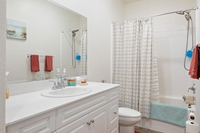 bathroom with vanity, toilet, and shower / tub combo with curtain