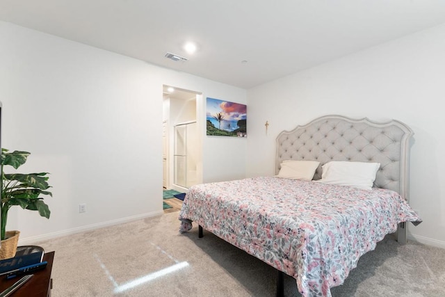 bedroom with carpet floors, baseboards, and visible vents