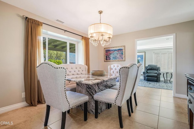 dining area with light tile patterned floors, visible vents, baseboards, and an inviting chandelier