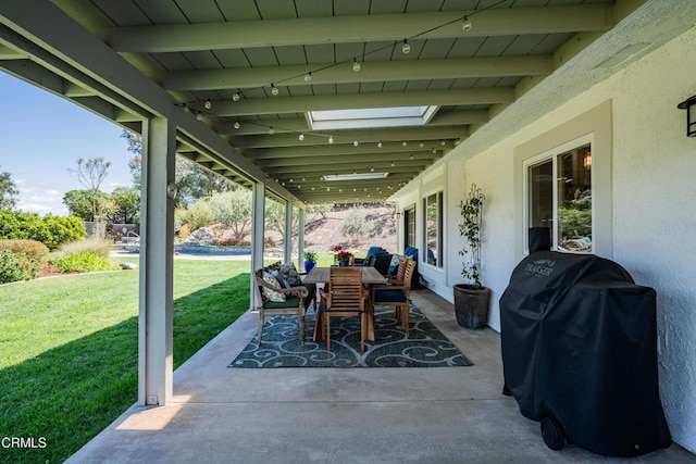 view of patio / terrace featuring grilling area and outdoor dining space