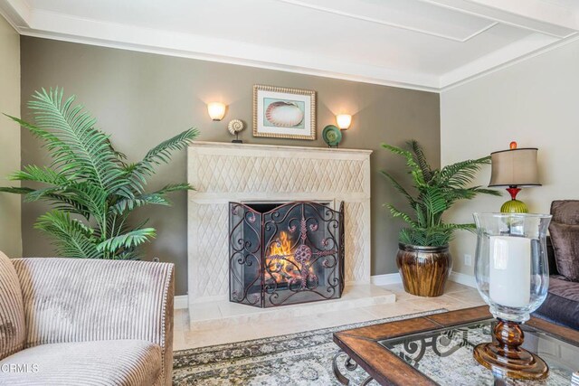 tiled living area with a high end fireplace