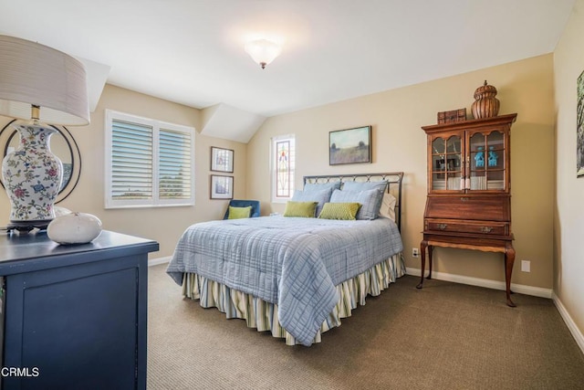 bedroom featuring baseboards and carpet floors