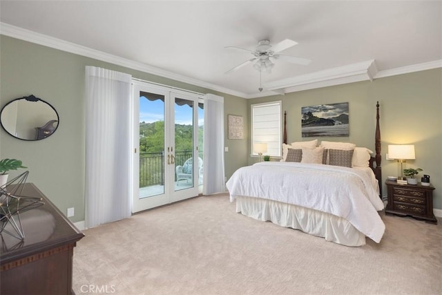 bedroom with carpet flooring, crown molding, french doors, and access to outside
