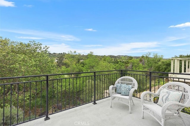 balcony with a wooded view