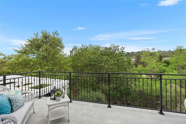 balcony with an outdoor hangout area