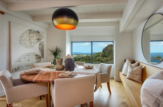 2604 Victoria Dr, Laguna Beach, CA 92651 - dining area featuring beamed ceiling and light wood-style flooring