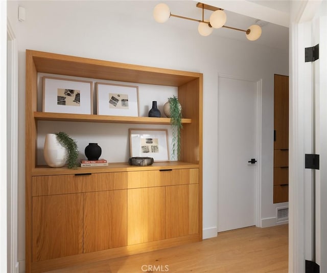 2604 Victoria Dr, Laguna Beach, CA 92651 - detailed view of wood finished floors and a chandelier