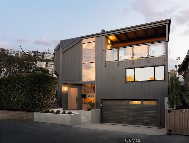 2604 Victoria Dr, Laguna Beach, CA 92651 - contemporary home featuring driveway and an attached garage