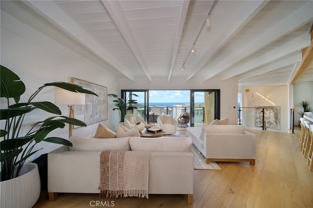 2604 Victoria Dr, Laguna Beach, CA 92651 - living room with beamed ceiling, track lighting, and wood finished floors