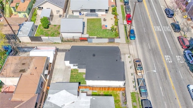 birds eye view of property with a residential view