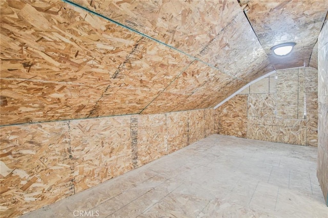bonus room featuring lofted ceiling