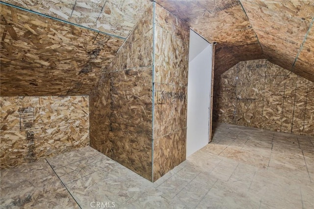 bonus room featuring lofted ceiling