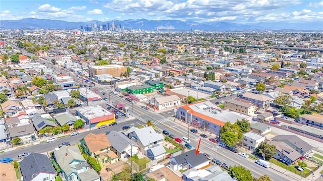 drone / aerial view featuring a mountain view