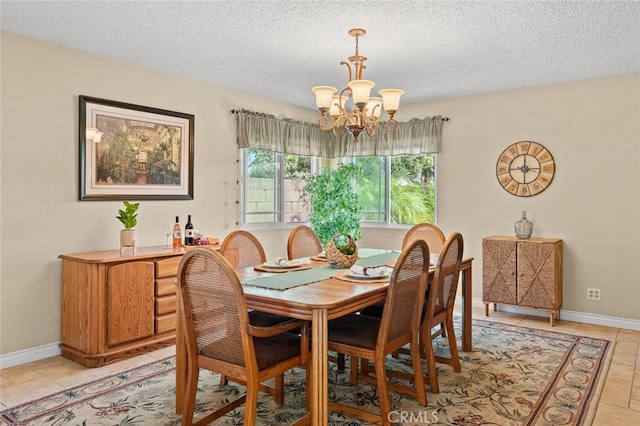 20140 Bouma Ct, Cerritos, CA 90703 - dining room with a chandelier, a textured ceiling, baseboards, and light tile patterned floors