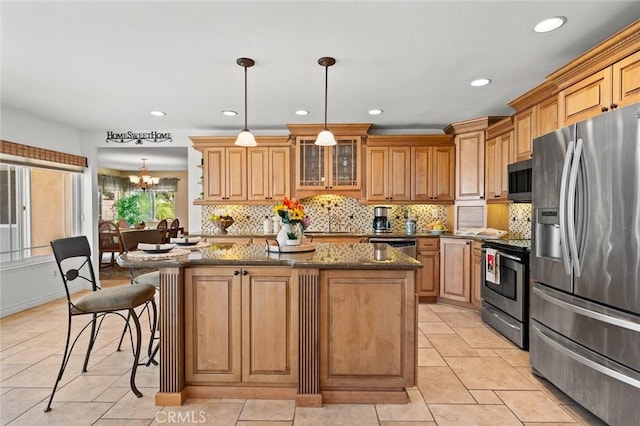 20140 Bouma Ct, Cerritos, CA 90703 - kitchen featuring stainless steel appliances, backsplash, recessed lighting, a center island, and a chandelier