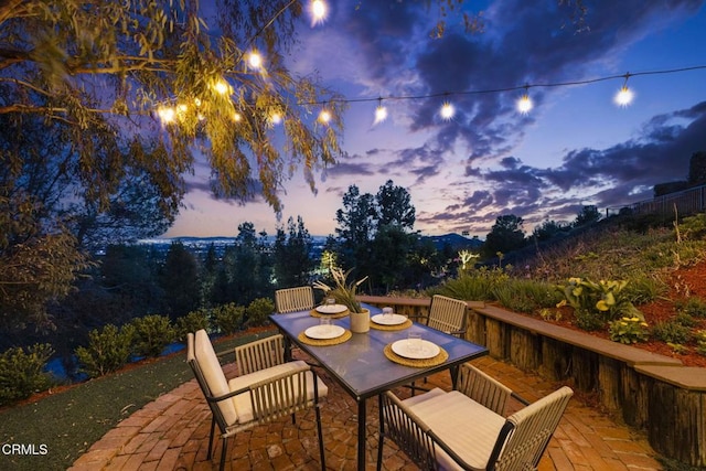 view of patio featuring outdoor dining area