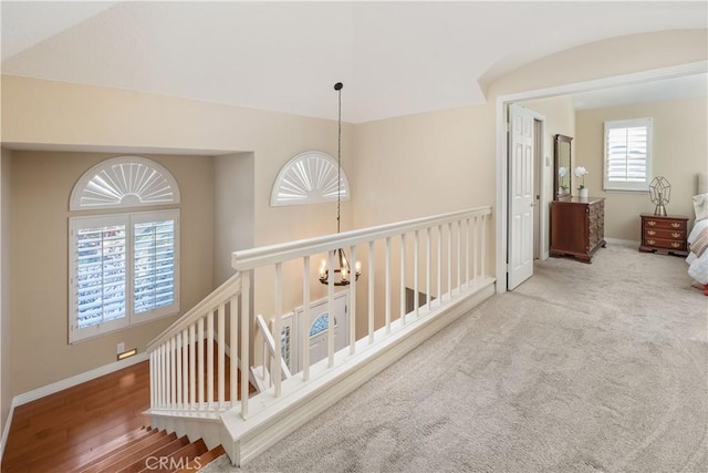 24118 Saint Moritz Dr, Valencia, CA 91355 - corridor with a chandelier and an upstairs landing