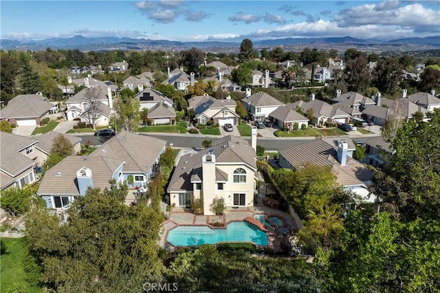 bird's eye view featuring a residential view and a mountain view