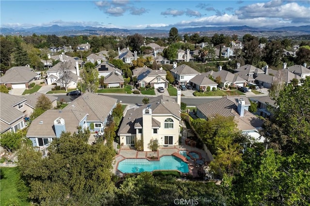 24118 Saint Moritz Dr, Valencia, CA 91355 - aerial view of residential area with a mountain backdrop and a pool area