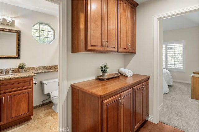 24118 Saint Moritz Dr, Valencia, CA 91355 - ensuite bathroom with vanity and toilet