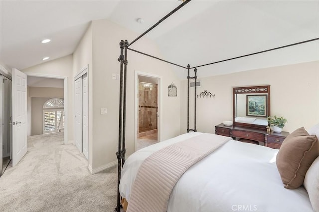 24118 Saint Moritz Dr, Valencia, CA 91355 - bedroom with vaulted ceiling, light colored carpet, recessed lighting, and ensuite bathroom