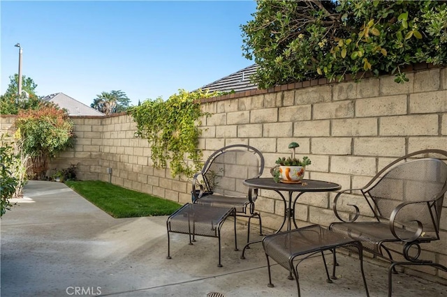 24118 Saint Moritz Dr, Valencia, CA 91355 - fenced backyard featuring a patio area