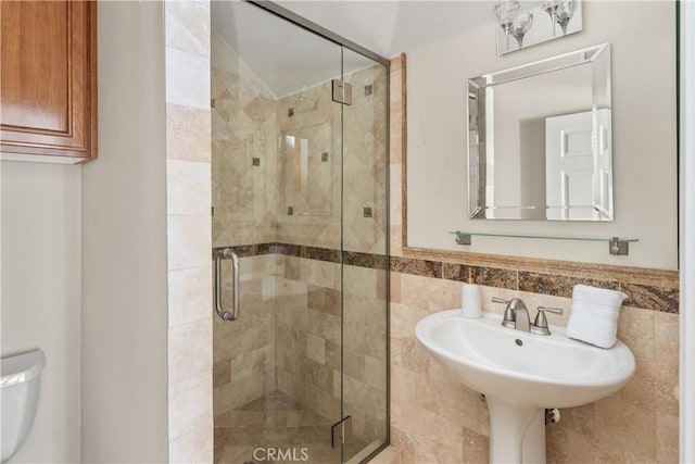 24118 Saint Moritz Dr, Valencia, CA 91355 - bathroom featuring a shower stall and tile walls