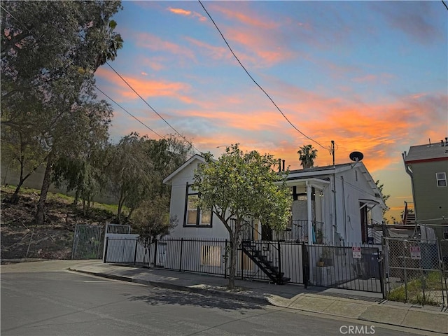 1708 E 3rd St, Los Angeles, CA 90033 - view of front of home with a fenced front yard and a gate